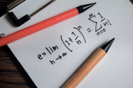 Concept of definition of the Euler's number write on book isolated on Wooden Table.の写真素材