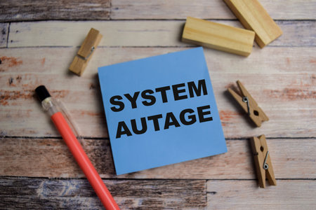 Concept of system write on sticky notes isolated on Wooden Table.
