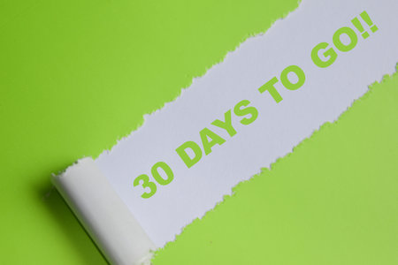 30 Days to go!! Text written in torn paper