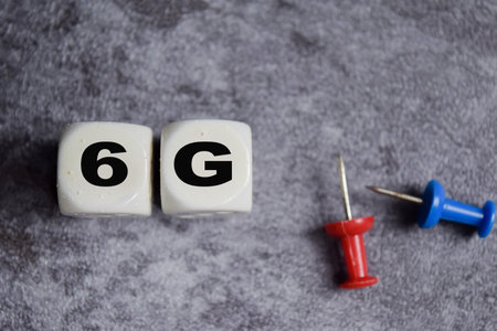 6G on stacked wooden cubes on the table. Business and finance conceptの写真素材