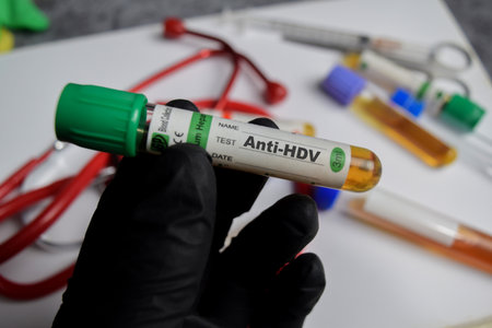 Anti-HDV vaccination drug in black gloved hands. Medical concept