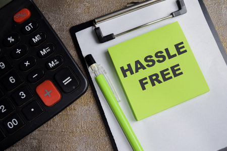 Concept of Hassle free write on sticky notes isolated on Wooden Table.の写真素材