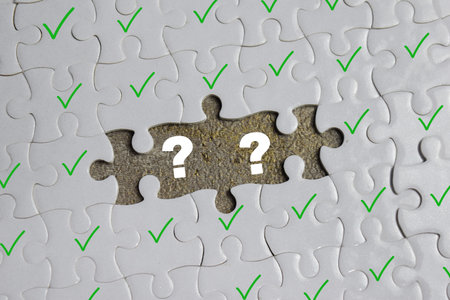 Piece of jigsaw puzzle with symbol question mark and correct . Business and finance concept