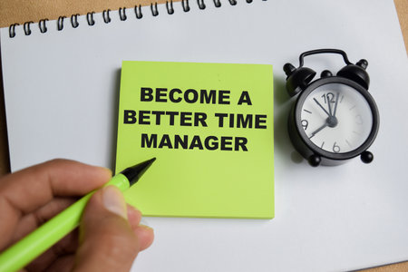 Concept of become a better time manager write on sticky notes isolated on Wooden Table.の写真素材