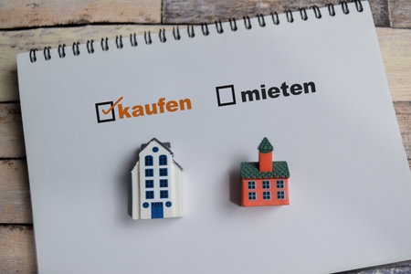 Concept of Kaufen or mieten in German it means Buy or rent write on book with keywords isolated on...