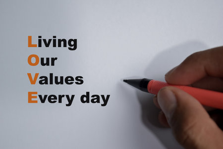 Concept of Living Our Values Every day write on book isolated on Wooden Table.の写真素材