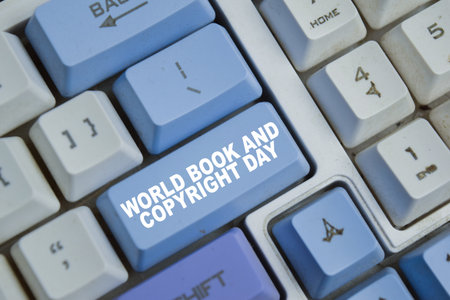 World book and copyright day is an annual event, educational and cultural organization button on the keyboardの写真素材