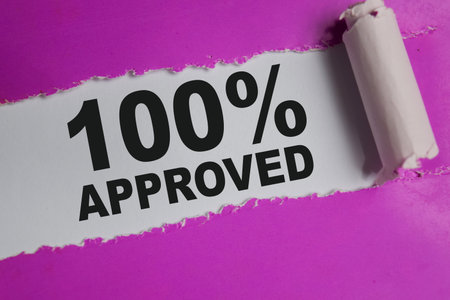 100 percent Text written in torn paper.の写真素材