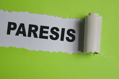 Paresis Text written in torn paper.の写真素材