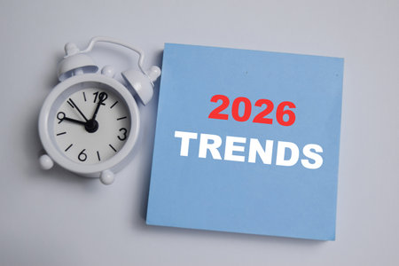 Concept of 2026 trends write on sticky notes isolated on Wooden Table.