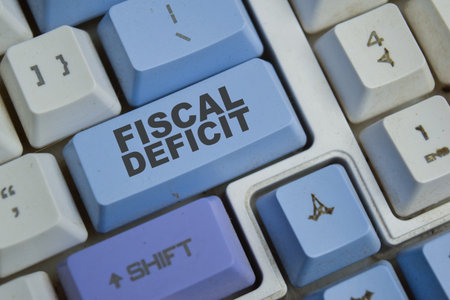Fiscal deficit is a shortfall in a government income button on the keyboard