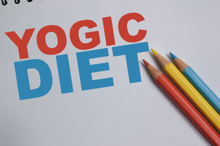 Concept of diet write on book isolated on Wooden Table.