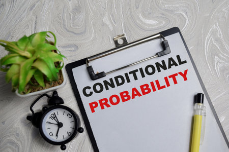 Concept of conditional probability write on clipboard isolated on Wooden Table.の写真素材