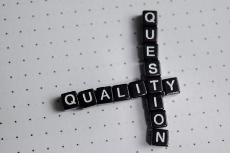 Concept of quality and question written on wooden blocks.の写真素材