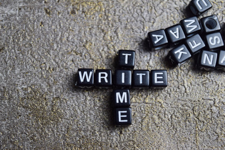 Concept of write time words arranged with on wooden letter blocks.の写真素材
