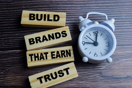 Concept of text build that earn on wooden blocks.の写真素材