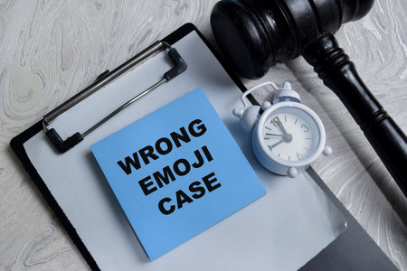 Concept of wrong emoji case write on sticky notes isolated on Wooden Table.