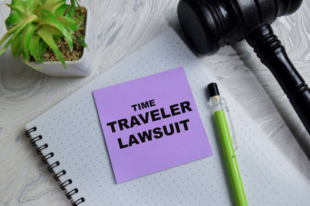 Concept of time traveler lawsuit write on sticky notes isolated on Wooden Table. Representing legal...
