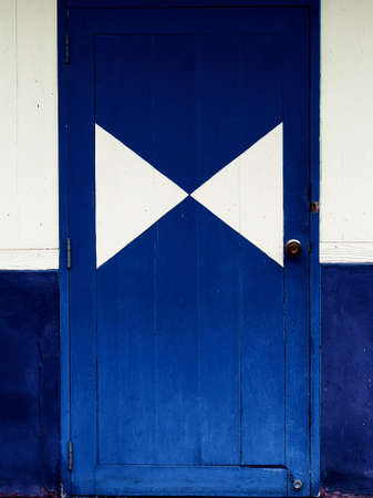blue door with white graphicの写真素材
