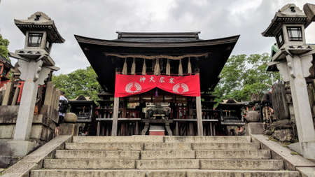 Ancient shrine at the top of Fushimi Inari Taisha (Kami-no-Yashiro). Voyagers journey on this short...