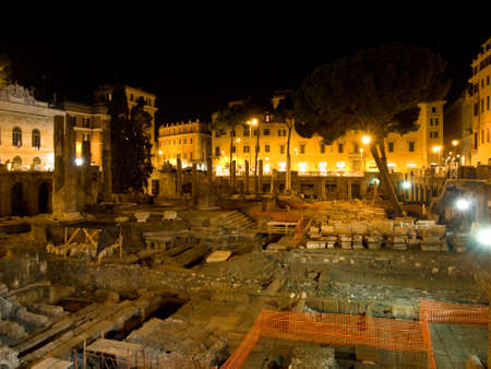 Ancient ruins in the center of Rome at night.の写真素材