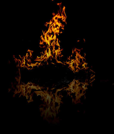 abstract fire pattern on mirror in darkness backgroundの写真素材