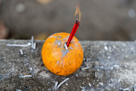 ncense on orange and burning fire - can use to display or montage productの写真素材