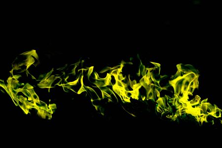 abstract green frame of fire texture on black backgroundの写真素材