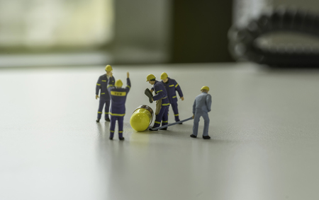 mini workers are check midicine in desk and sun light filter - can use to display or montage on productの写真素材