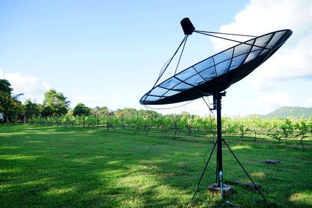 sattelite dish in the wine field and skyの写真素材