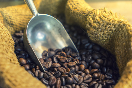 coffee beans on close-up with abstract vintage filter - can use to display or montage on productの写真素材