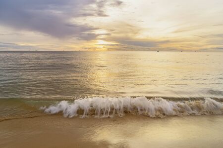 abstract sunset and sea with wave splash and sand - can use to display or montage on product