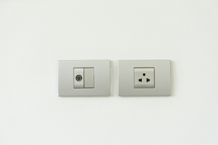 electronic switch house on white wall - can use to display or montage on productの写真素材