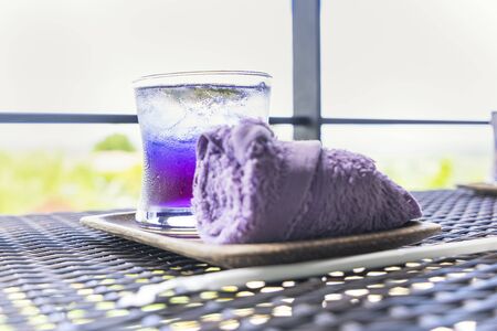 abstract violet welcome drink on weave table - can use to display or montage on productの写真素材