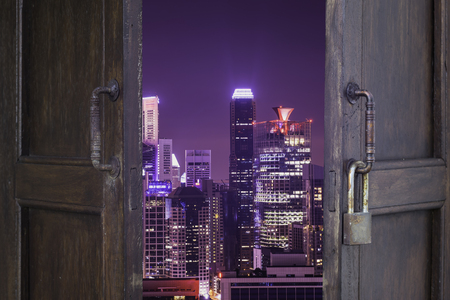 vintage wood window open to cityscape , world changed - can use to display or montage on productのeditorial素材