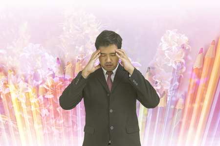 abstract businessman headache on double exposure background - can use to display or montage on productの写真素材