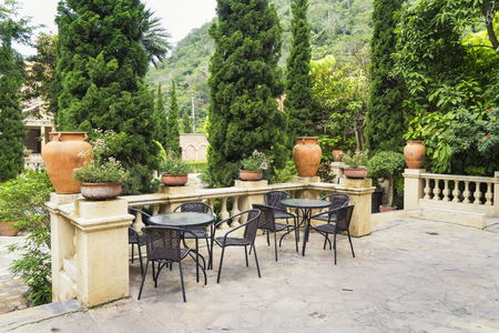 scene of tea table for relax in conner of garden - can use to display or montage on productの写真素材