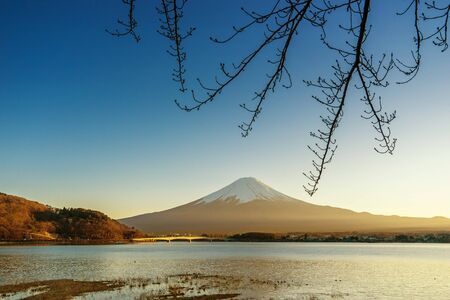 mountain fuji view in winter season and sun light golden filter - can use to display or montage on productの写真素材