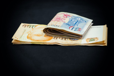 abstract banknote of singapore on dark filter - can use to display or montage on product