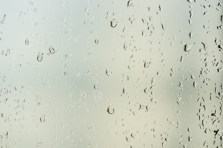 abstract water drop on glass bathroom for background or backdrop use