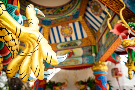 golden dragon craws scrulpture in vintage colorful place - can use to display or montage on productのeditorial素材