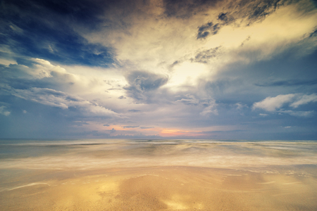 surreal seascape and cloudscape beach - can use to display or montage on productの写真素材