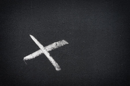 X character on empty black chalkboard - can use to display or montage on productの写真素材