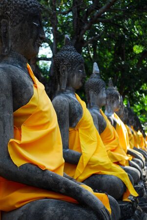 The buddha statue group at Wat yai in thailandの写真素材