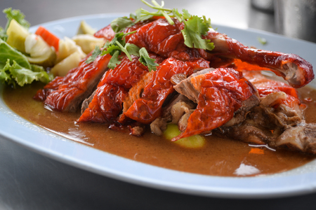 Peking Duck in dish on the tableの写真素材