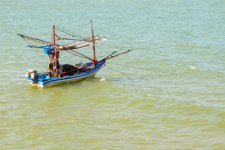 Abandoned boat in sea