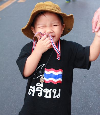 little boy in kor kor por sor protest at Asoke, thailandのeditorial素材