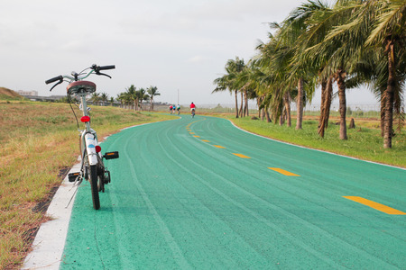bike on green bike wayの写真素材