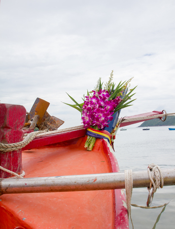 flower on head boat in thai trust the boat has a god on head boatの写真素材