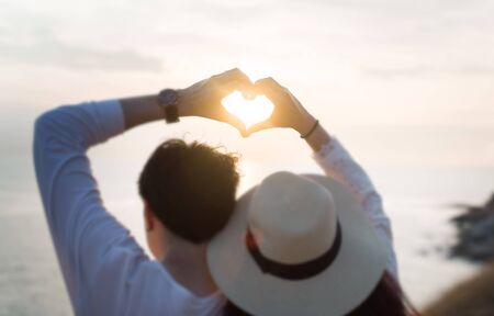 Sea love summer silhouette with blurry backgroundの写真素材
